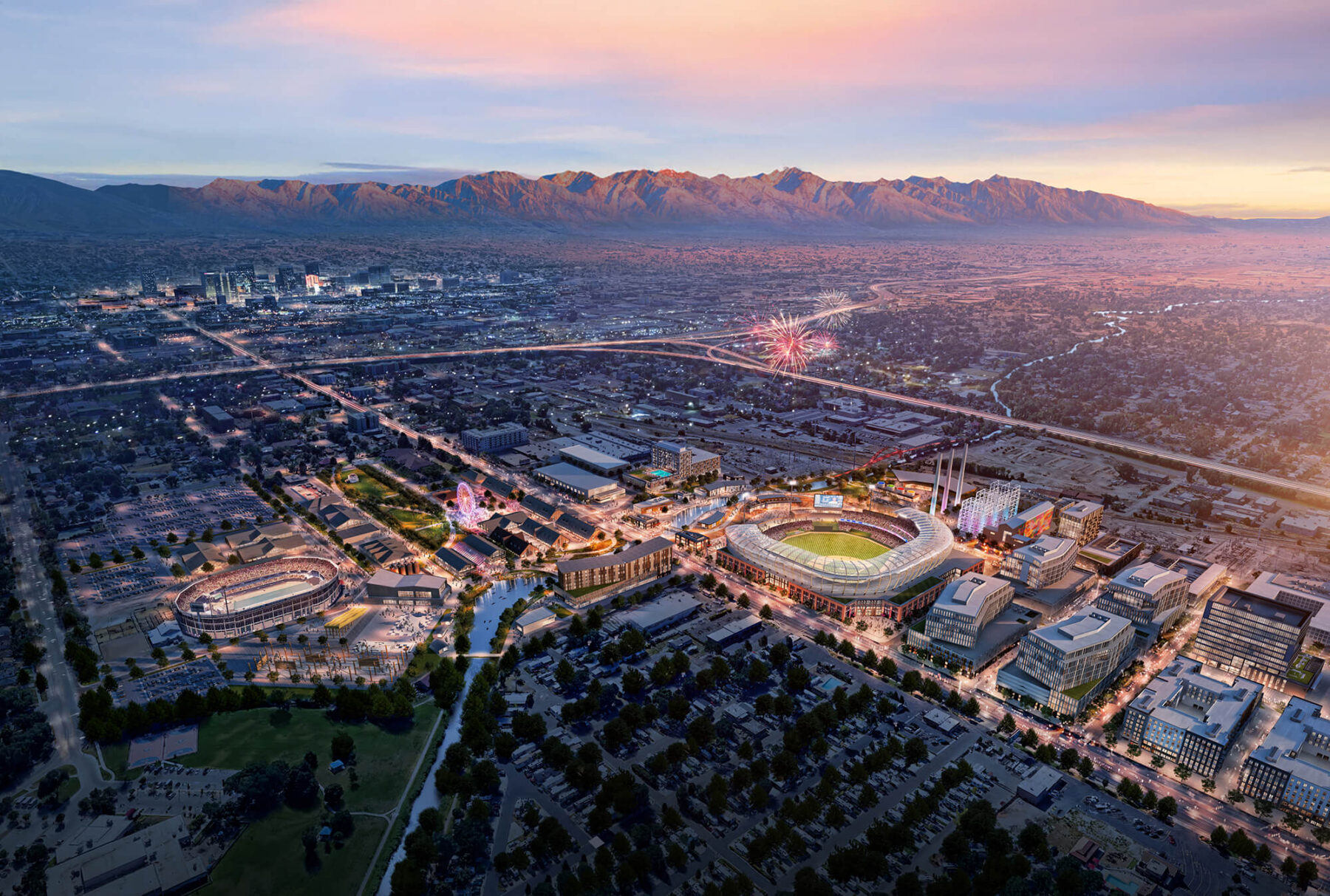 Vista aérea del distrito de negocios del oeste de Salt Lake al atardecer, mostrando un gran estadio deportivo, edificios circundantes, montañas distantes y fuegos artificiales, destacando el potencial de la zona para el desarrollo listo para iniciar en Utah.