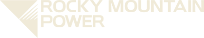 Rocky Mountain Power logo with a stylized triangle on the left and the company name in uppercase letters, set on a white background, representing the Salt Lake westside business district.